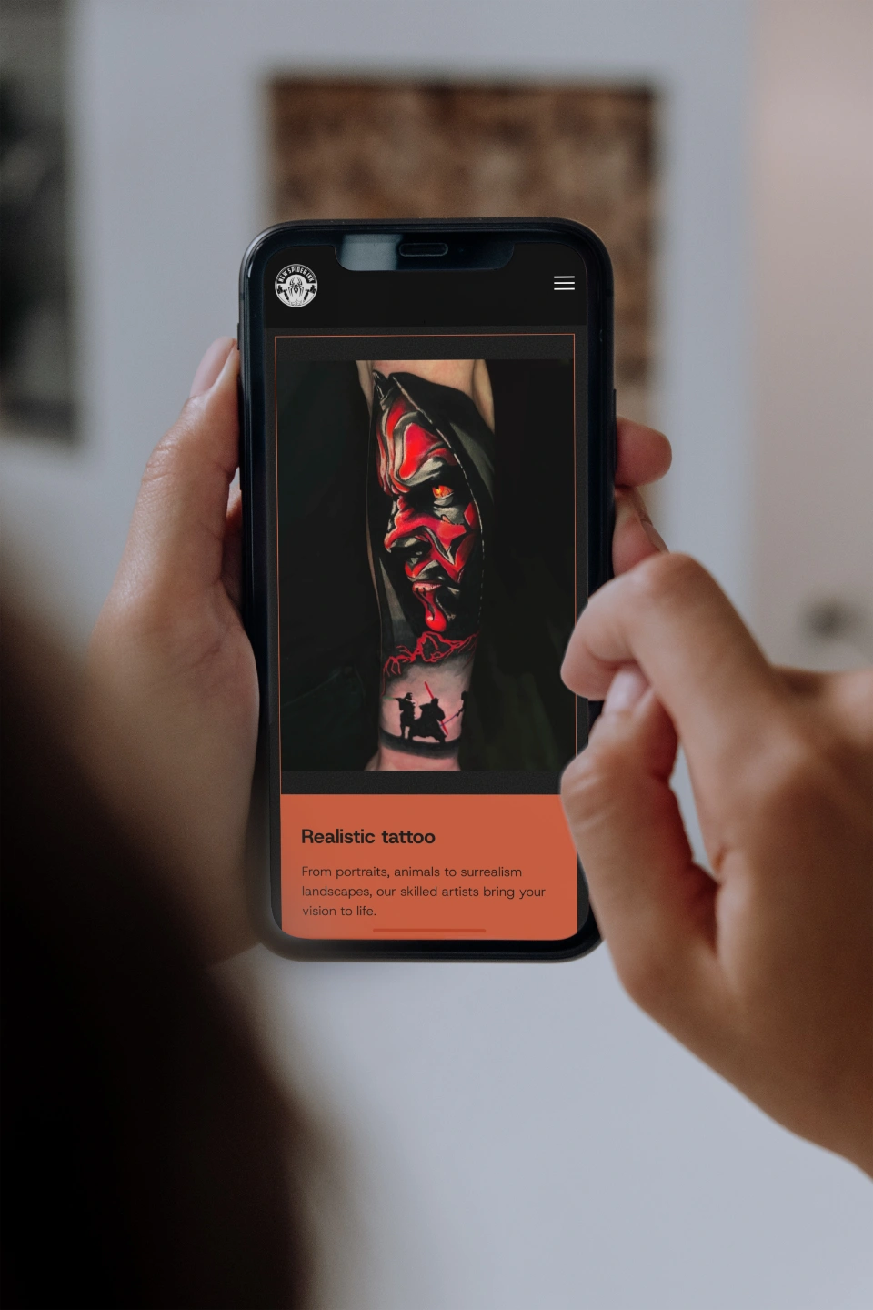 person browsing new spider ink website case study on iphone
